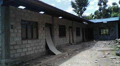 rebuilding primary school destroyed by earthquake.
