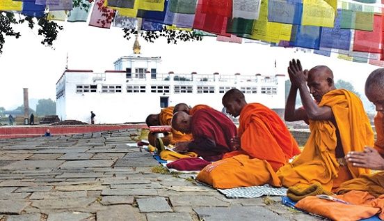 Monk at Lumbini the birthplace of Buddha